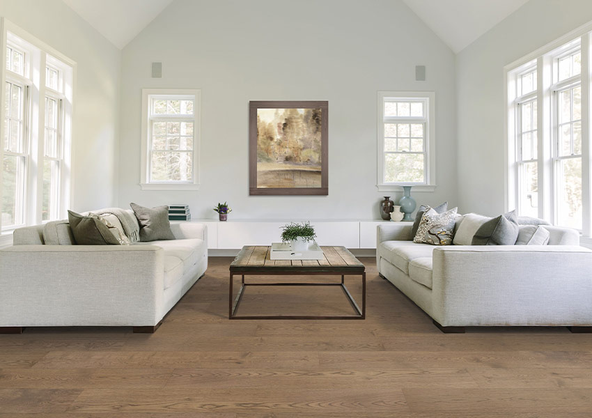 warm toned hardwood flooring in living room